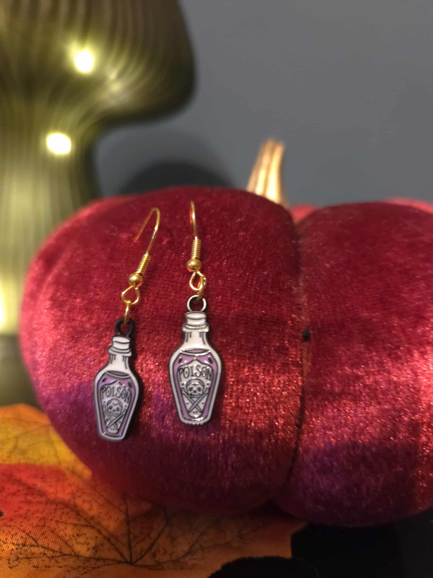 boucles d'oreilles bouteille poison