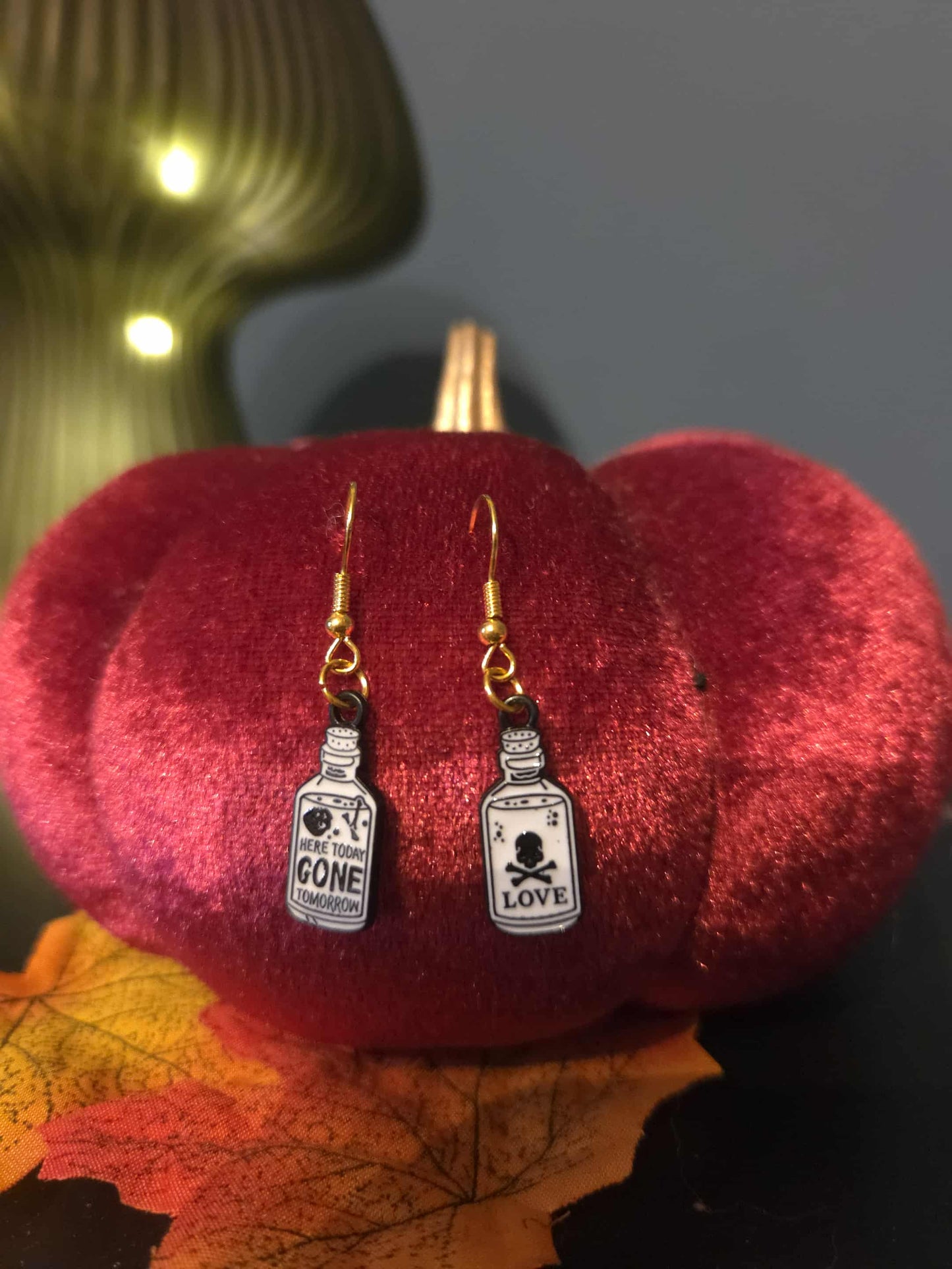 boucles d'oreilles bouteille poison