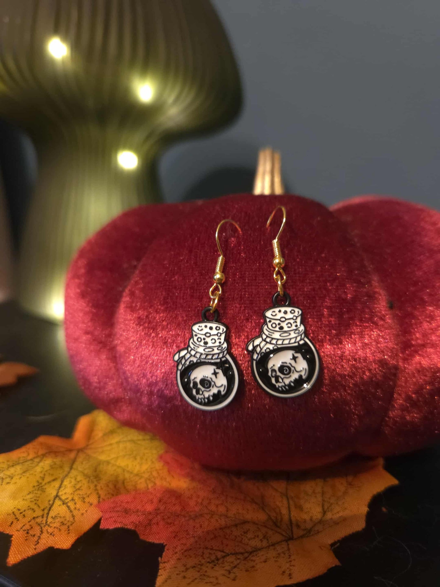 boucles d'oreilles bouteille poison